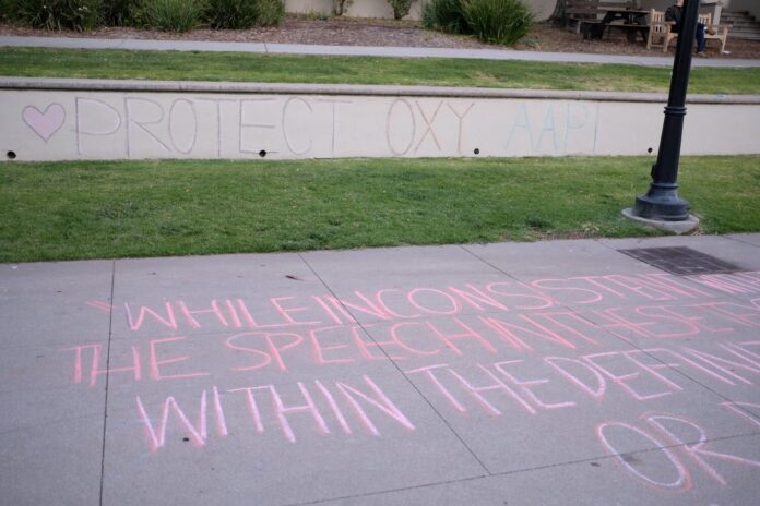 chalk messages in front of the cooler